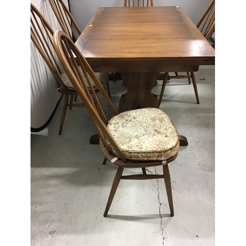 337 - BADGED ERCOL DRAWER LEAF DINING TABLE WITH REFECTORY STYLE STRETCHERED BASE AND 6 MATCHING ERCOL CHA... 