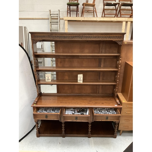 381 - BADGED OLD CHARM DRESSER WITH OPEN RACK CARVED FREEZE BASE WITH 3 DRAWERS  ON 4 FRONT TURNED LEGS WI... 