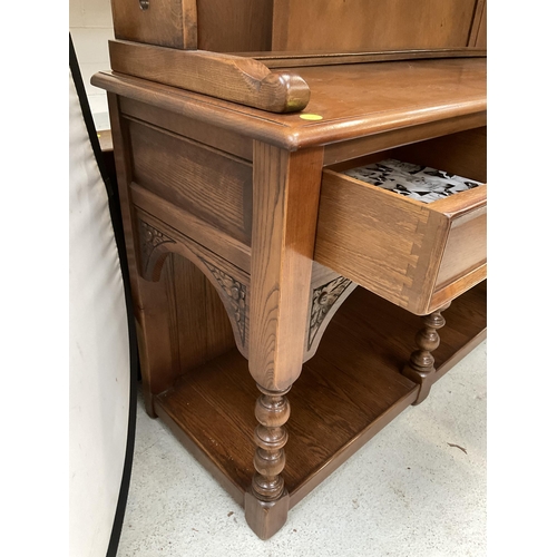 381 - BADGED OLD CHARM DRESSER WITH OPEN RACK CARVED FREEZE BASE WITH 3 DRAWERS  ON 4 FRONT TURNED LEGS WI... 