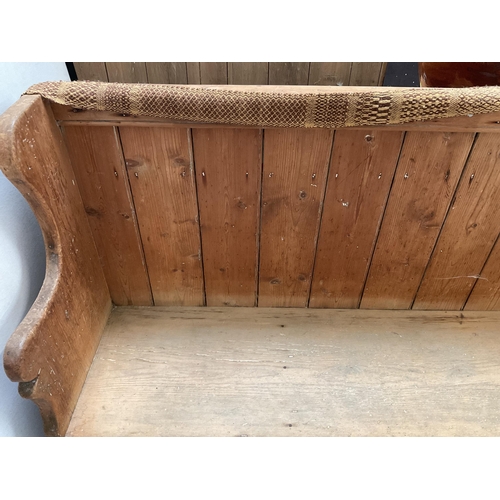 406 - VICTORIAN STRIPPED PINE SETTLE WITH SHAPED ENDS - H46