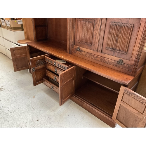 416 - BADGED OLD CHARM LOUNGE UNIT TOP WITH OPEN SHELVES 2 GLASS LEADED DOORS WITH DROP DOWN BUREAU WITH L... 