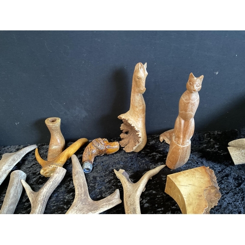 20 - BOX OF HORNS, CARVED ANIMAL HEADS ETC