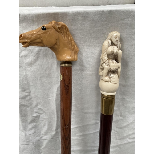 9 - 3 WALKING CANES WITH DECORATIVE CARVED HANDLES (RAMS HEAD, EROTIC, HORSES HEAD) - H 37