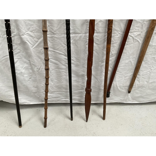 31 - QTY OF CARVED HANDLED WALKING STICKS
Longest 37