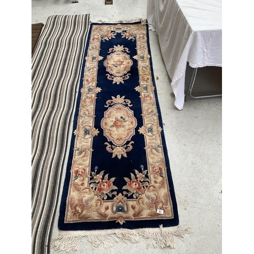 38 - QTY OF PATTERNED CARPET RUNNERS
Blue L99