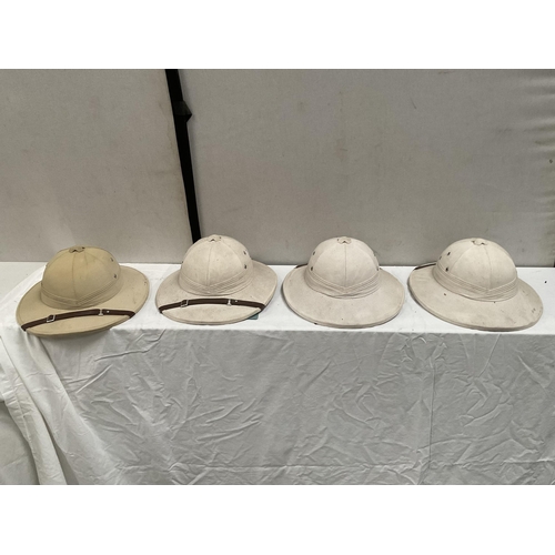 41 - 4 VINTAGE PITH HELMETS