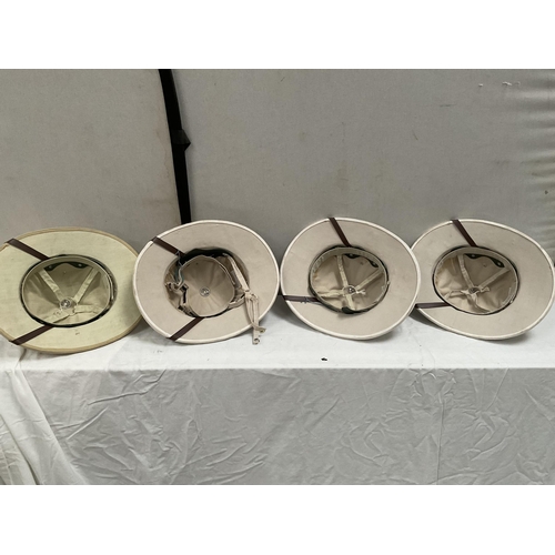 41 - 4 VINTAGE PITH HELMETS