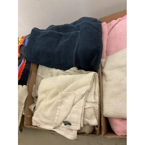 95 - 4 BOXES OF TOWELS, SHEETS AND A SHEEPSKIN RUG ETC