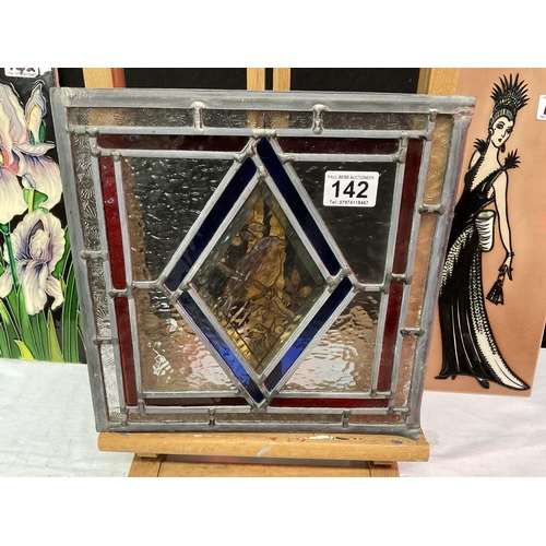 142 - 2 DECORATIVE TILES AND A STAINED GLASS PANEL DECORATED WITH BIRD AND FOILAGE
WINDOW 11