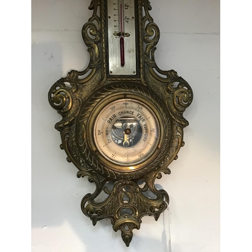 105 - VINTAGE ORNATE BRASS WALL BAROMETER H22 W10