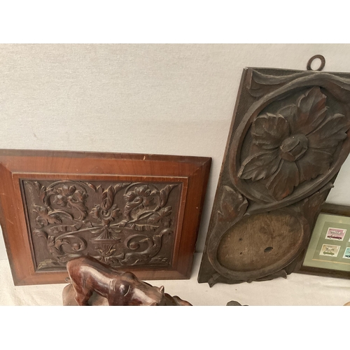 193 - BOX OF CARVED ITEMS TO INCLUDE BOOK ENDS, CARVED PANELS ETC