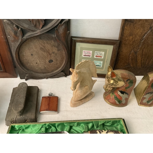 193 - BOX OF CARVED ITEMS TO INCLUDE BOOK ENDS, CARVED PANELS ETC