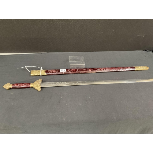 231 - 3 REPRODUCTION DECORATIVE SWORDS 40