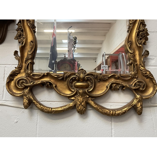 272 - MODERN REPRODUCTION ORNATE GILT STYLE DECORATIVE WALL MIRROR OF LARGE PROPORTIONS 68