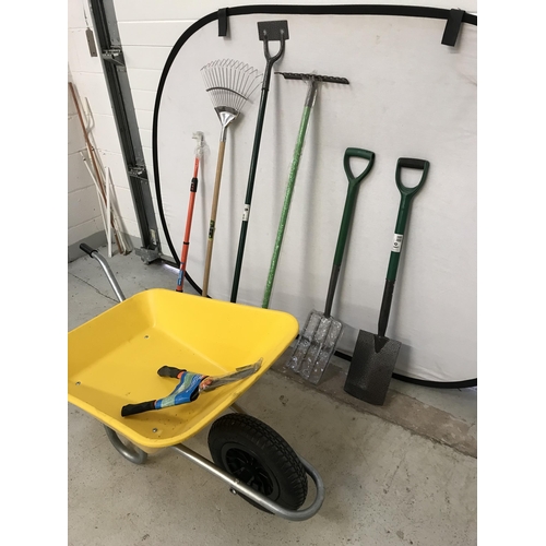 297 - GARDEN WHEELBARROW AND A SELLECTION OF GARDEN TOOLS