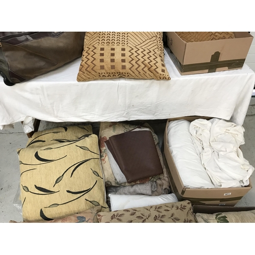 311 - 7 BOXES OF SCATTER CUSHIONS, LINEN ETC A CASE AND A COMPASS HOLDALL