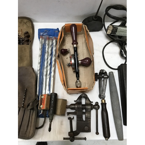 314 - BOX OF VINTAGE TOOLS TO INCLUDE A VINTAGE TYRE CUTTER, VICE, OIL CAN, DRILL BITS, 7LB WEIGHT ETC