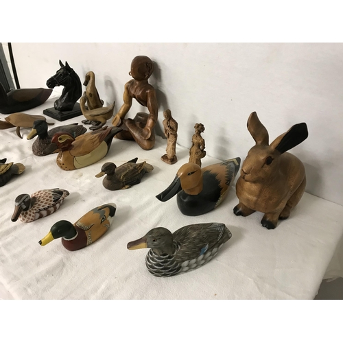 391 - BOX OF CARVED WOODEN  ANIMALS AND FIGURES