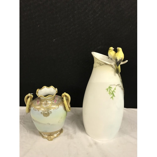 398 - GRAFF PORCELAIN VASE DECORATED WITH BIRDS AND FOILAGE AND A ORIENTAL STYLE TWIN HANDLED VASE