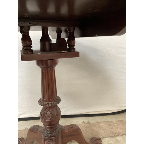 418 - REPRODUCTION MAHOGANY TIP TOP TABLE ON BALL AND CLAW FEET WITH BIRD CAGE MOVEMENT - H30