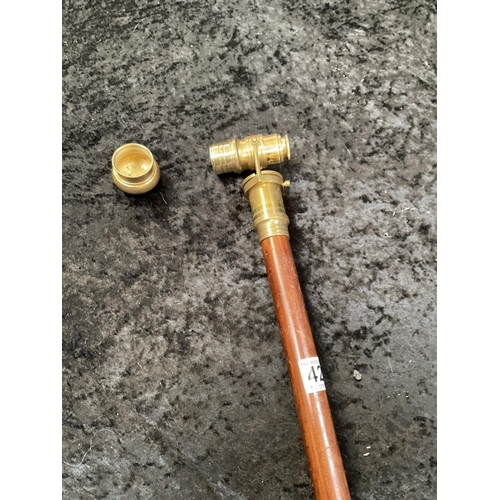 428 - 2 MODERN WALKING CANES 1 FITTED WITH A BRASS TELESCOPE AND 1 WITH A COMPASS - LONGEST 36