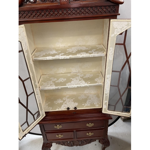 446 - REPRODUCTION MAHOGANY DISPLAY CABINET WITH 2 ASTRICAL GLAZED DOORS OVER 3 DRAWERS ON BALL AND CLAW F... 