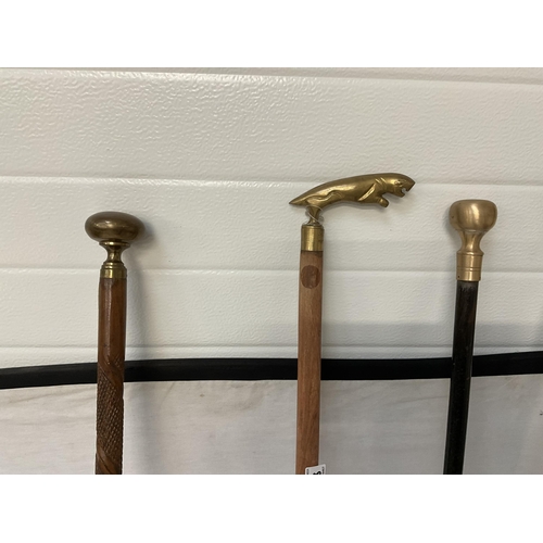 468 - 4 BRASS TOPPED WALKING CANES