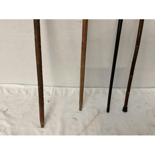 468 - 4 BRASS TOPPED WALKING CANES