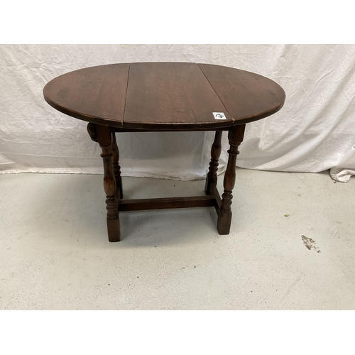 469 - DARK OAK SWIVEL TOP MINIATURE DROP LEAF TABLE DECORATED WITH A MOUSE H 19