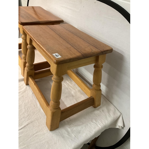 483 - PAIR OF BEECH STRETCHERED LAMP TABLES H 18