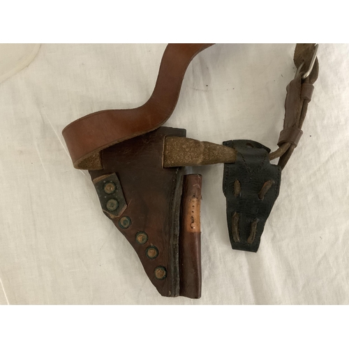 25 - VINTAGE LEATHER GUN HOLSTER, FRAMED OILS SIGNED E BURROWS AND A LAMP BASE