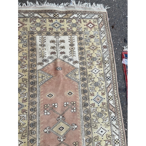 32 - 2 VINTAGE PATTERNED RUGS 
84 X 47