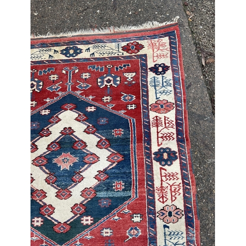 32 - 2 VINTAGE PATTERNED RUGS 
84 X 47