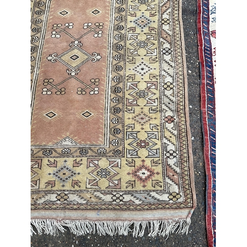 32 - 2 VINTAGE PATTERNED RUGS 
84 X 47