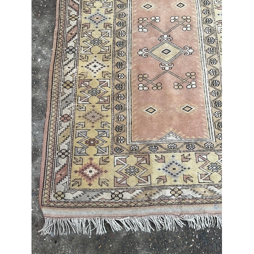 32 - 2 VINTAGE PATTERNED RUGS 
84 X 47