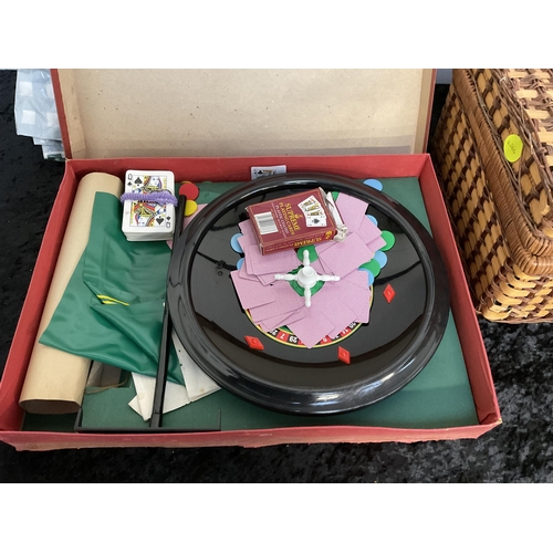 67 - WICKER PICNIC BASKET AND CONTENTS AND A VINTAGE ROULETTE GAME IN BOX