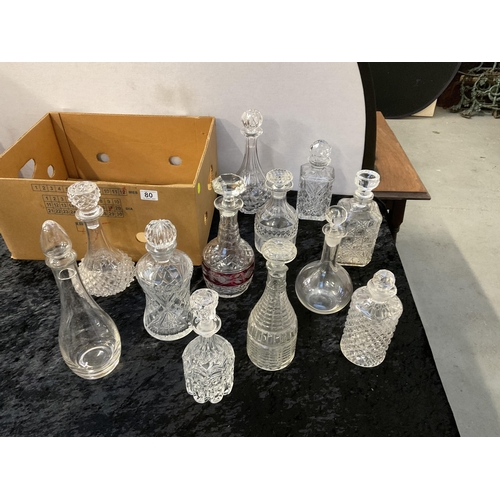 80 - A BOX OF 12 DECANTERS TO INCLUDE CUT GLASS EXAMPLES