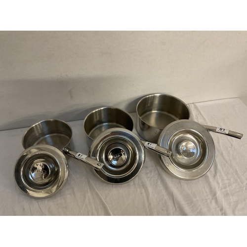 81 - SET OF 3 GRADUATED AGA STAINLESS STEEL SAUCEPANS COMPLETE WITH LIDS