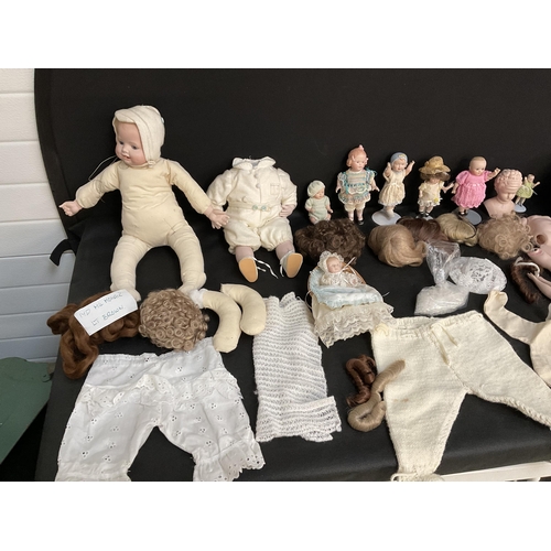 202 - BABYS CRIB AND VINTAGE DOLLS TO INCLUDE CHINA BODIED DOLLS ETC