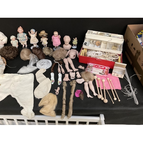 202 - BABYS CRIB AND VINTAGE DOLLS TO INCLUDE CHINA BODIED DOLLS ETC