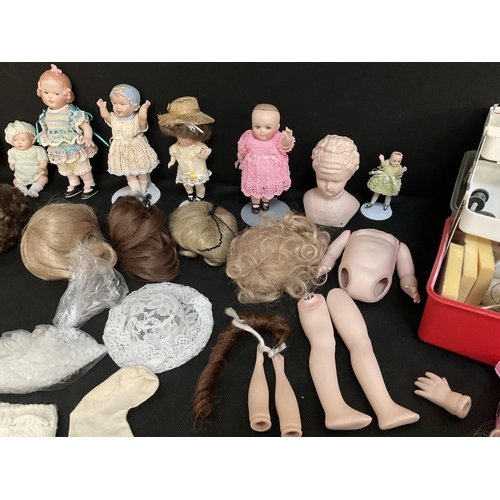 202 - BABYS CRIB AND VINTAGE DOLLS TO INCLUDE CHINA BODIED DOLLS ETC