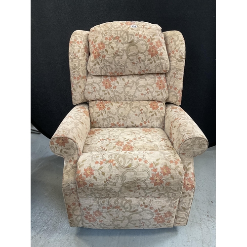 334 - BEIGE FLORAL UPHOLSTERED MANUAL RECLINING CHAIR