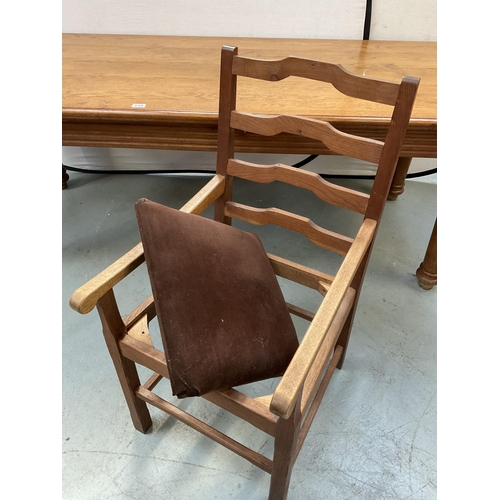 338 - LARGE HEAVY OAK DINING TABLE ON 4 TURNED LEGS WITH 8 MATCHING RAILBACK CHAIRS WITH UPHOLSTERED SEATS... 