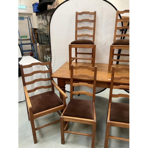 338 - LARGE HEAVY OAK DINING TABLE ON 4 TURNED LEGS WITH 8 MATCHING RAILBACK CHAIRS WITH UPHOLSTERED SEATS... 