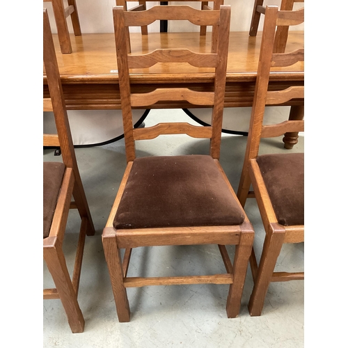 338 - LARGE HEAVY OAK DINING TABLE ON 4 TURNED LEGS WITH 8 MATCHING RAILBACK CHAIRS WITH UPHOLSTERED SEATS... 