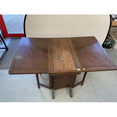 344 - VINTAGE OAK DROP LEAF TABLE FITTED WITH IRONING BOARD - H 30