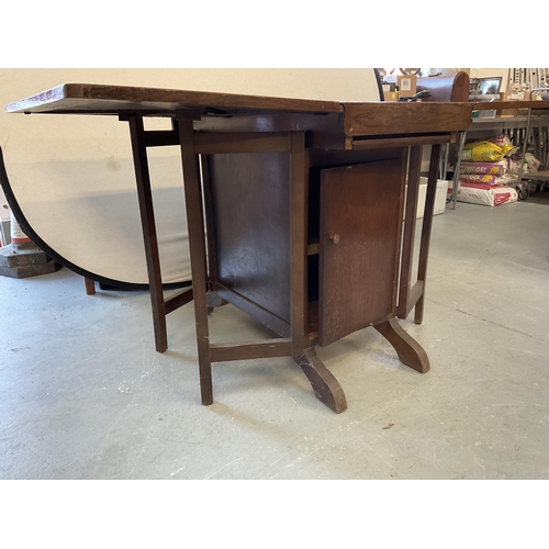 344 - VINTAGE OAK DROP LEAF TABLE FITTED WITH IRONING BOARD - H 30