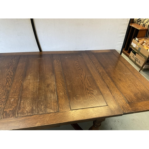 347 - VINTAGE OVER SIZED OAK STRETCHERED DRAWER LEAF DINING TABLE AND 8 MATCHING CHAIRS - H 30