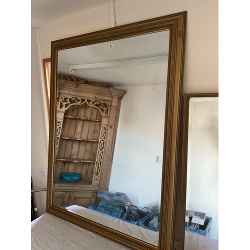 51 - 2 GILT FRAMED WALL MIRRORS 54