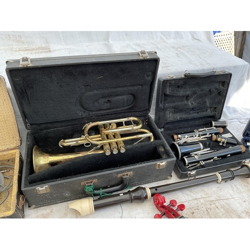 55 - CRATE OF MUSICAL INSTRUMENTS TO INCLUDE TAMBORINE, TRUMPET, HARMONICA, FLUTES, CLARINET ETC